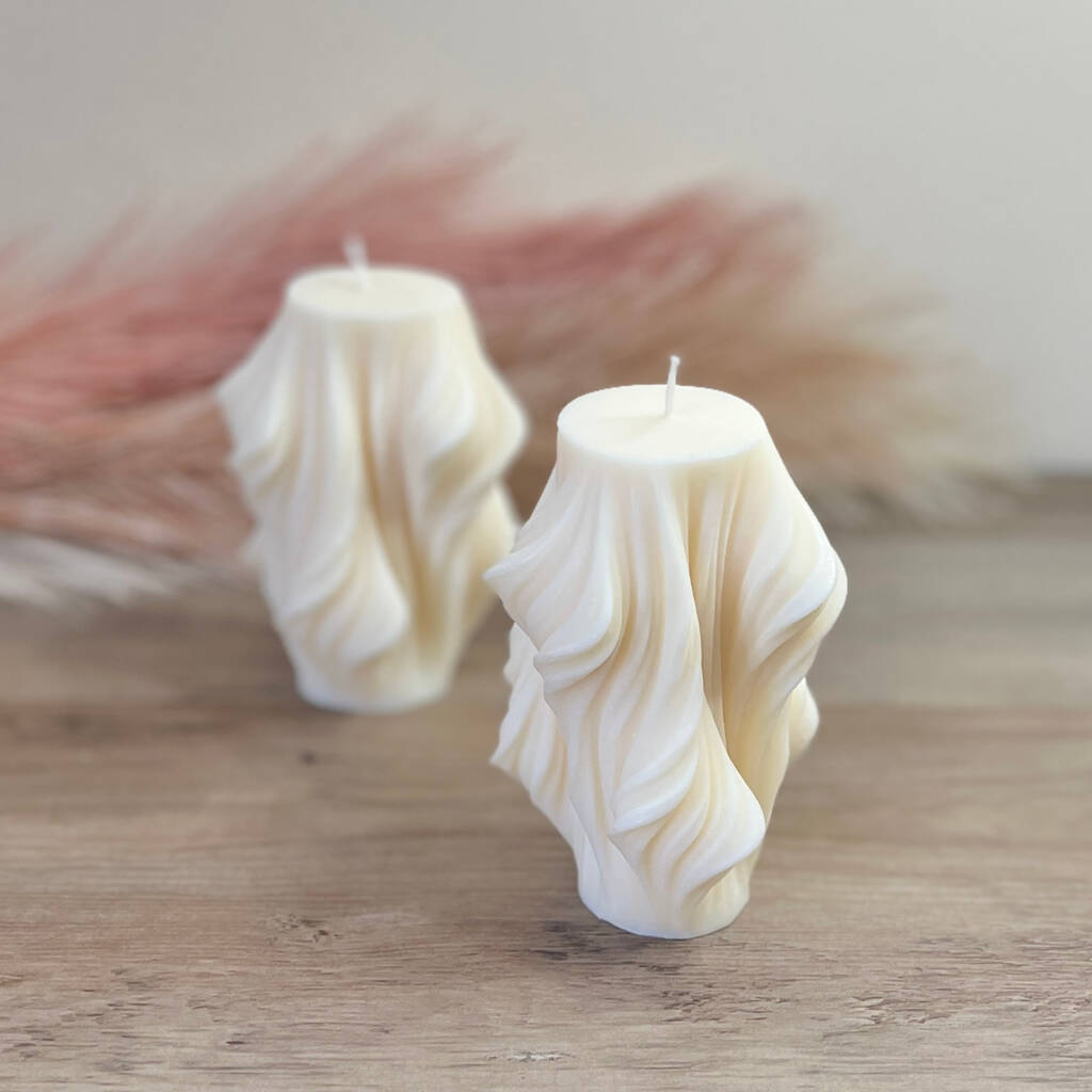 https://www.happyplacethings.com/cdn/shop/products/swirl-sculptural-aesthetics-candle-in-vegan-soy-wax_4_1024x1024.jpg?v=1681390140